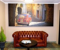 im Ristorante Casa Tripaldi mit dem großen Fiat 500-Bild