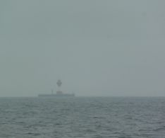 21 der Leuchtturm Kiel im Nebel und bei Nieselregen